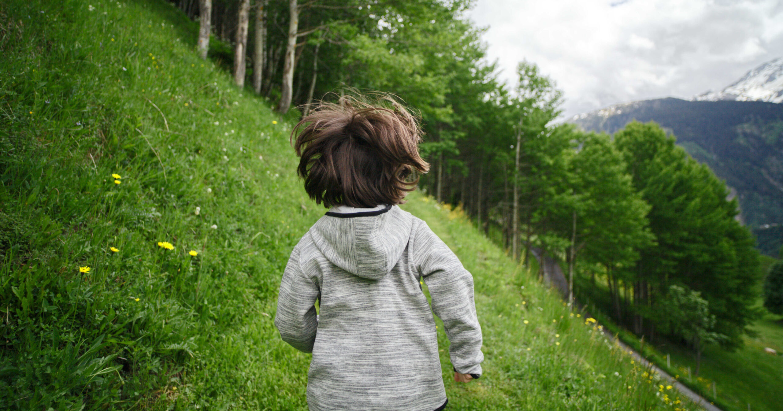child on steep hill