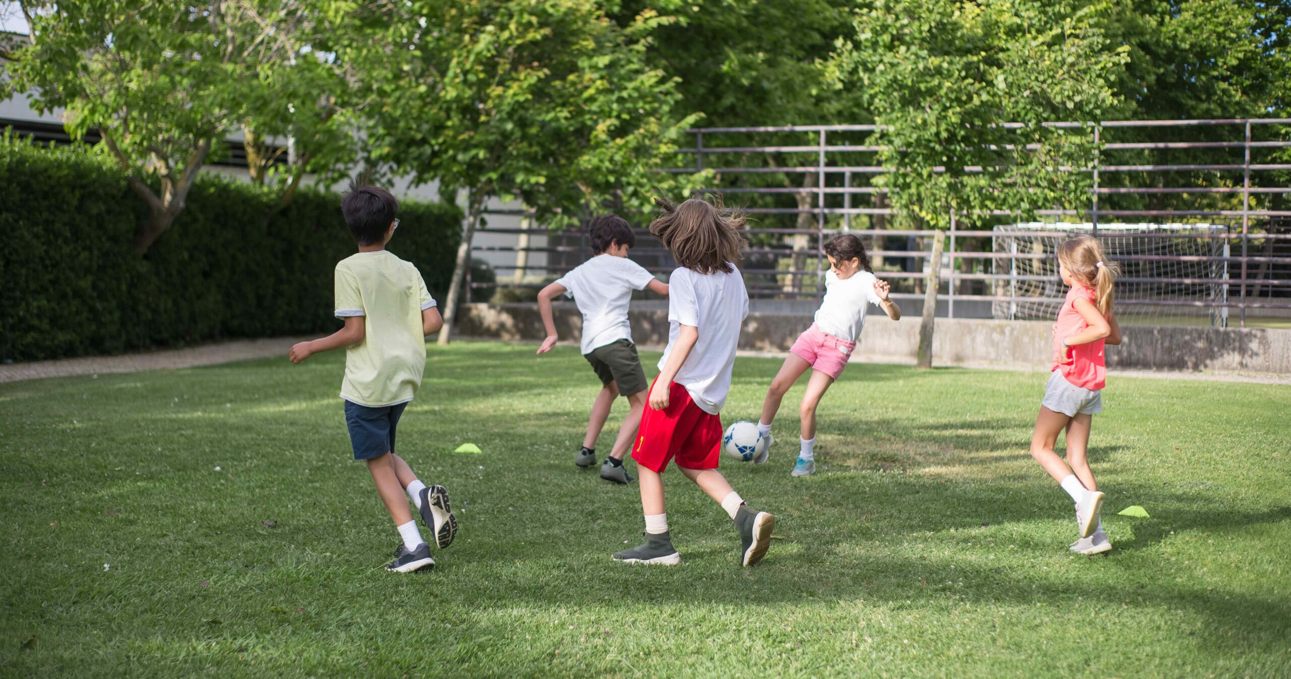 children playing football