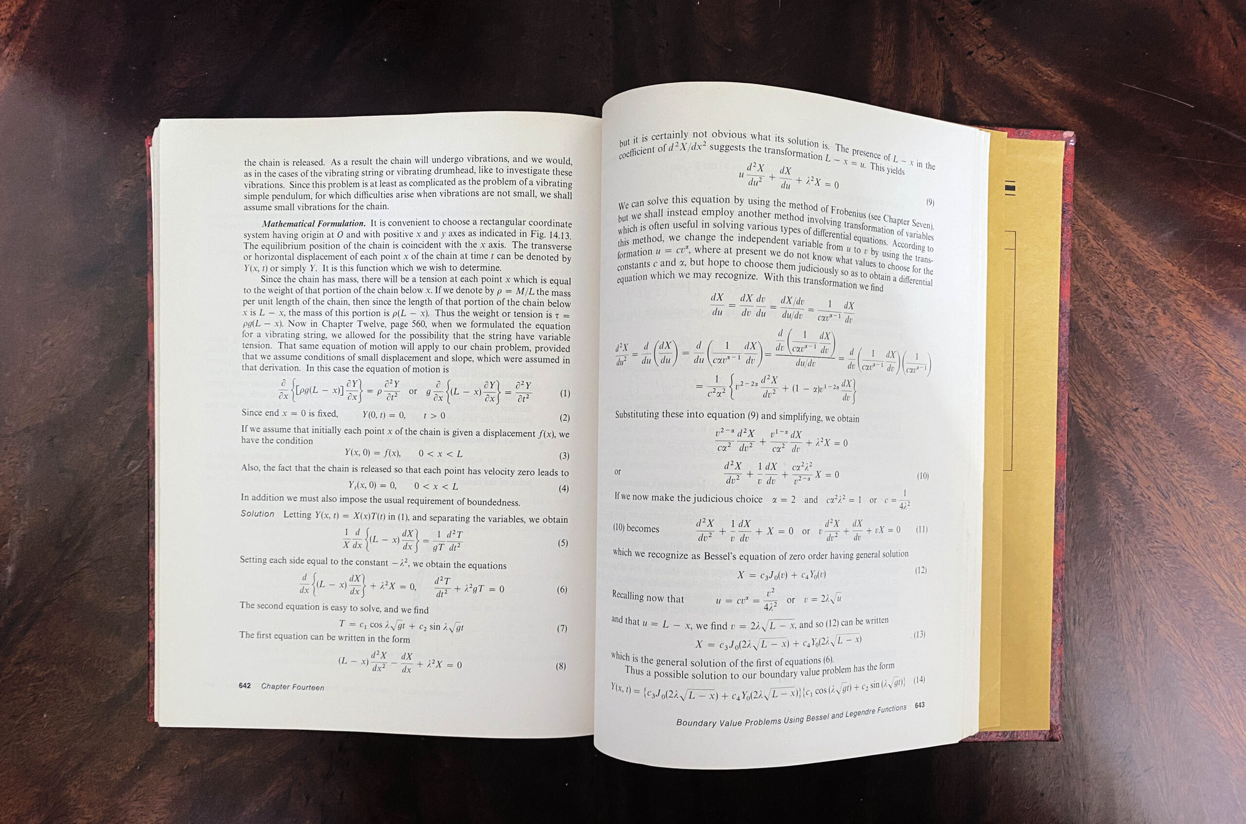 a mathematical textbook open, showing the two pages
