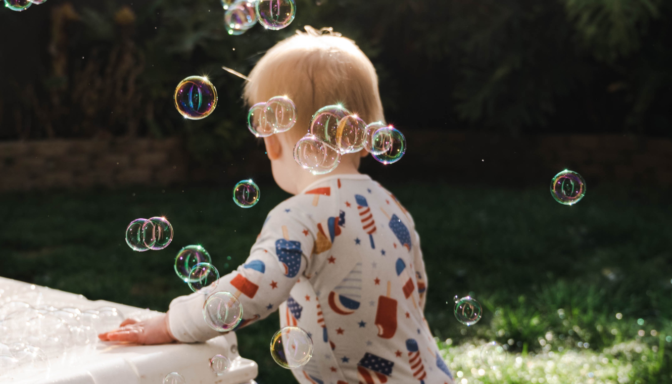 a young child with bubbles