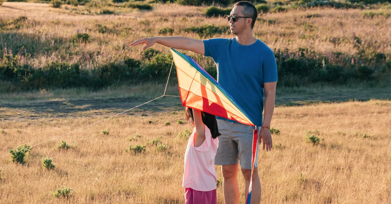 parent and child with kite